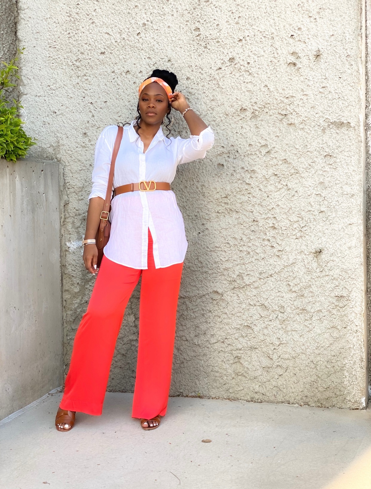 Orange satin pants with linen top